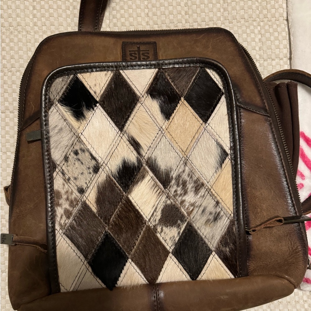 Sts Ranchwear leather backpack with cow hair patchwork front